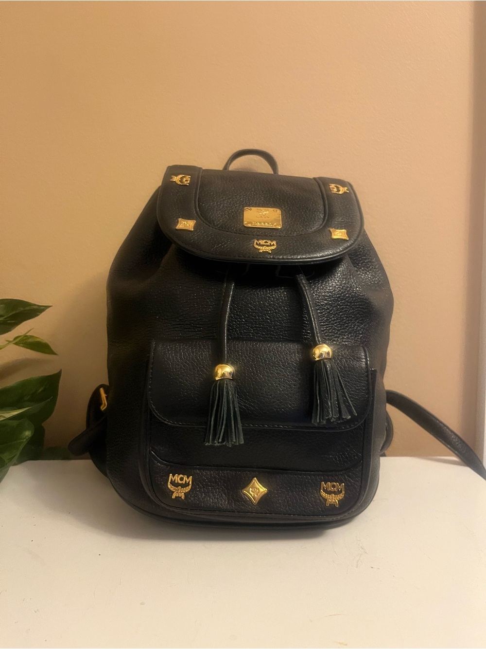 MCM Black Pebbled Leather Tassel Drawstring Small Backpack with Gold Hardware